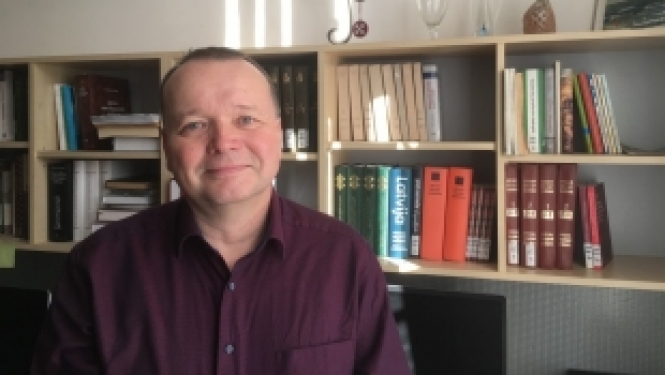 An assistant professor from Czechia conducts research on Czech-Latvian cultural ties