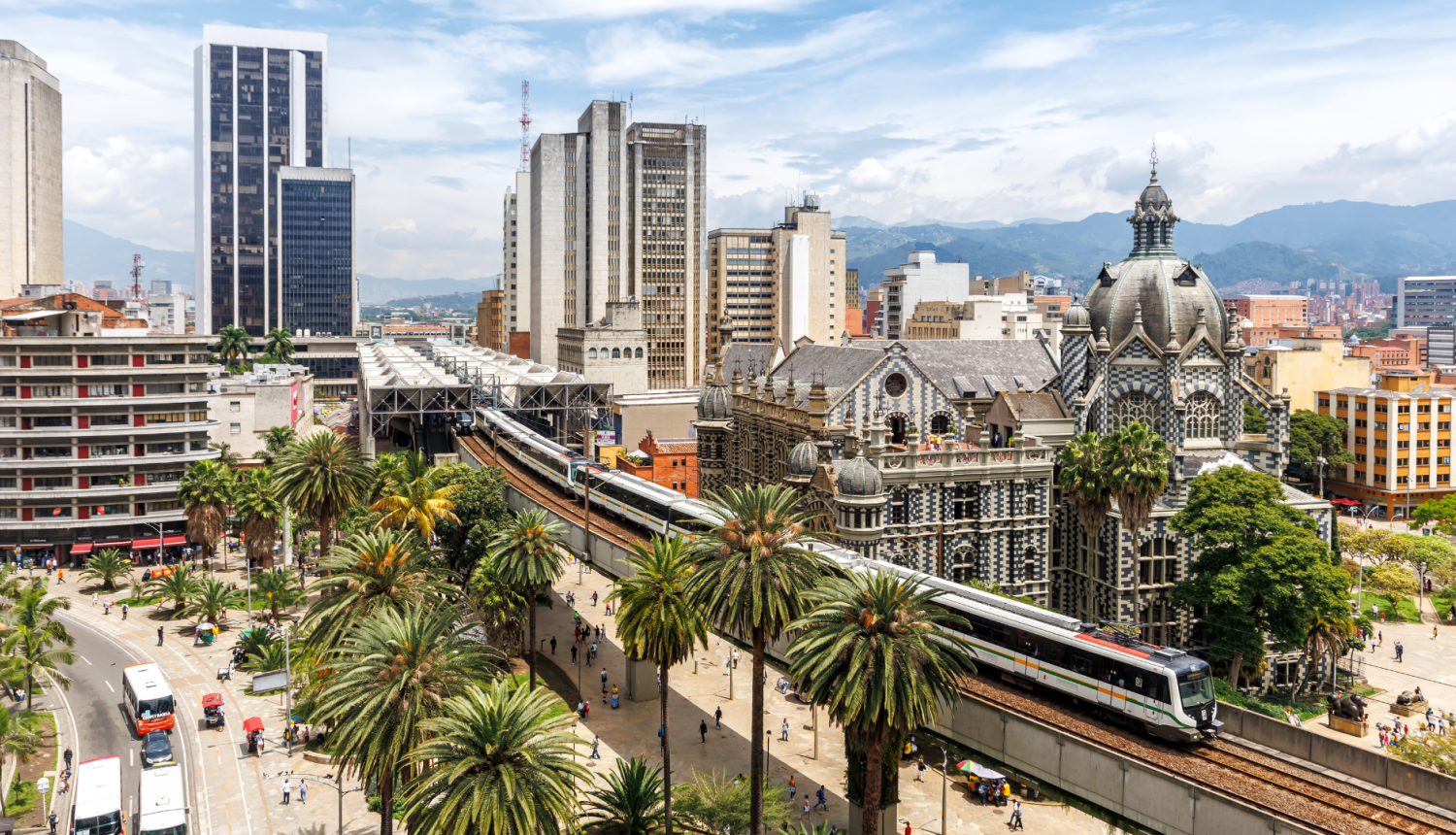 skats uz Kolumbijas pilsētu; ziņa par stipendiju Kolumbijā